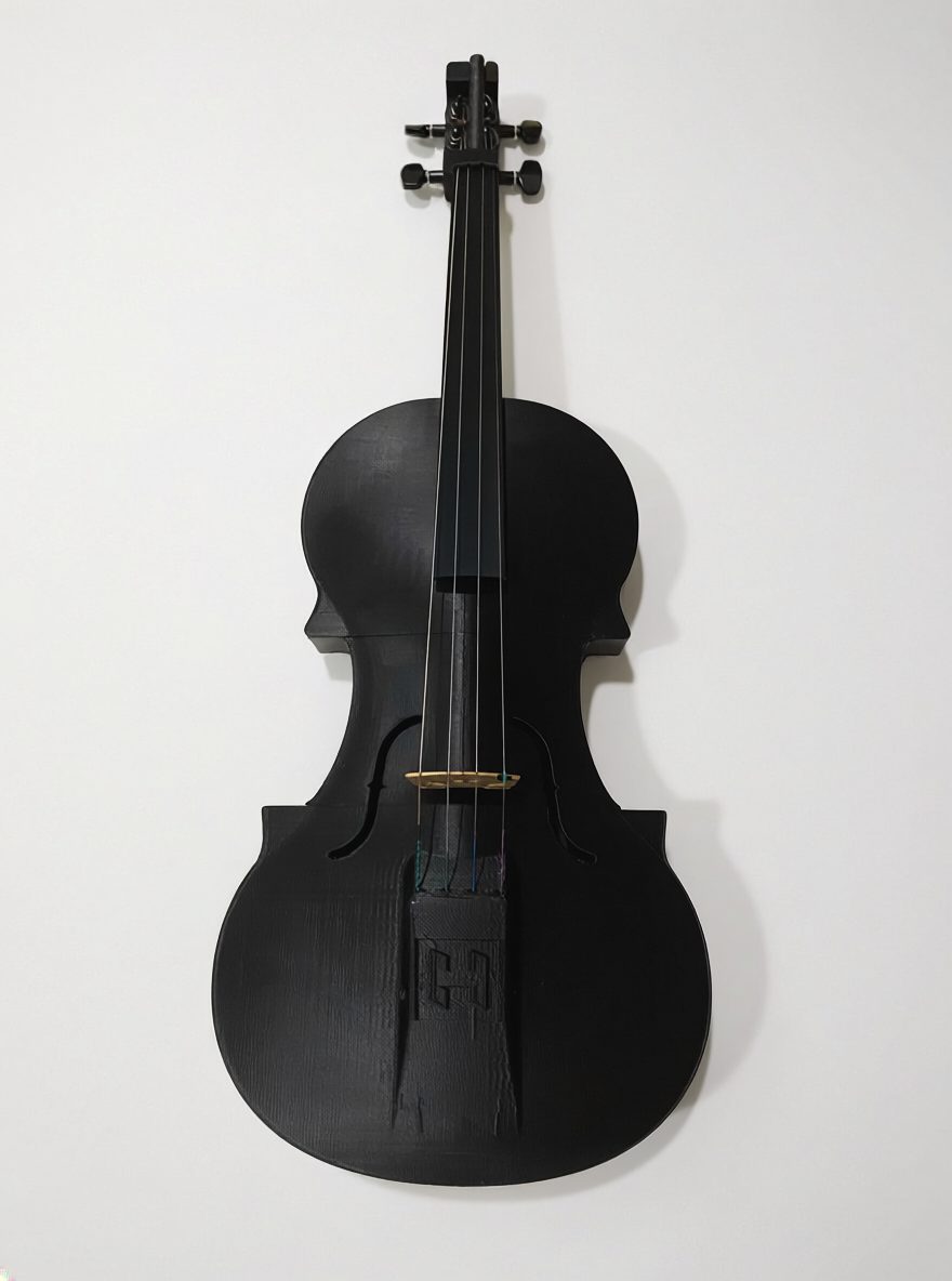A fully strung, playable 3D-printed violin, finished in matte black.